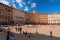 SIENA, ITALY Ã¢â¬â MAY 25, 2017: Campo Square Piazza del Campo, Palazzo Pubblico and Mangia Tower Torre del Mangia. Royalty Free Stock Photo